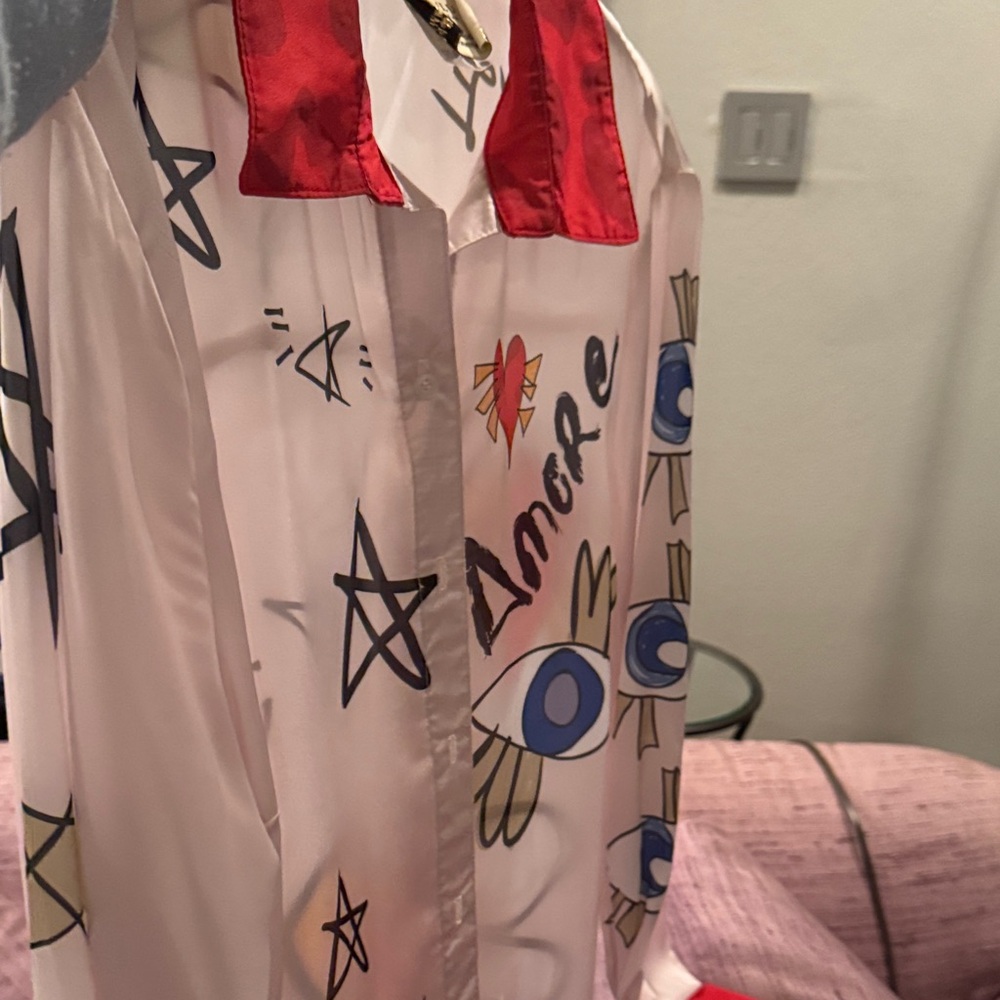 Ulu White Shirt with Red and Blue Graphic Accents